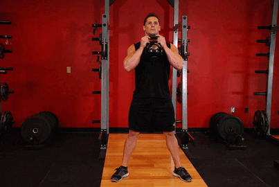 Taurelės pritūpimas su hanteliu